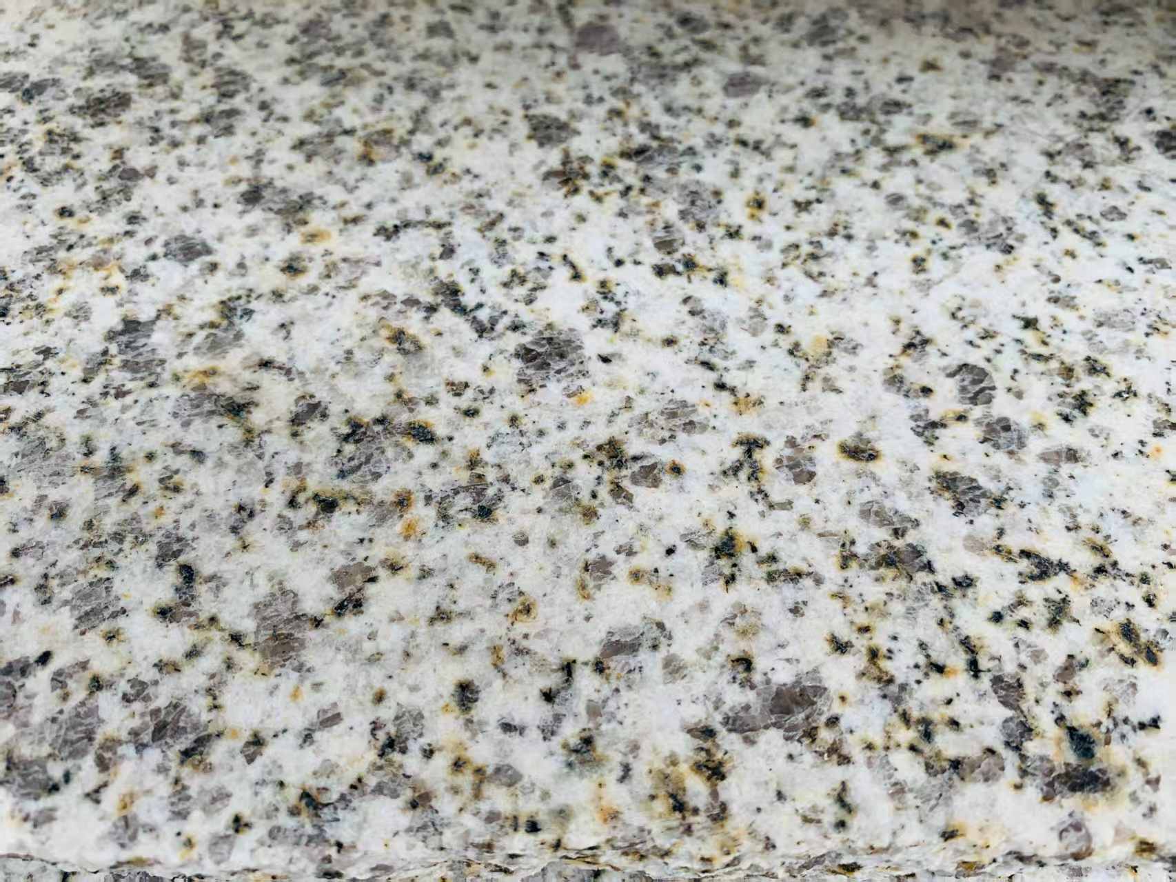 海南 黄金麻花岗岩石材浅黄光面