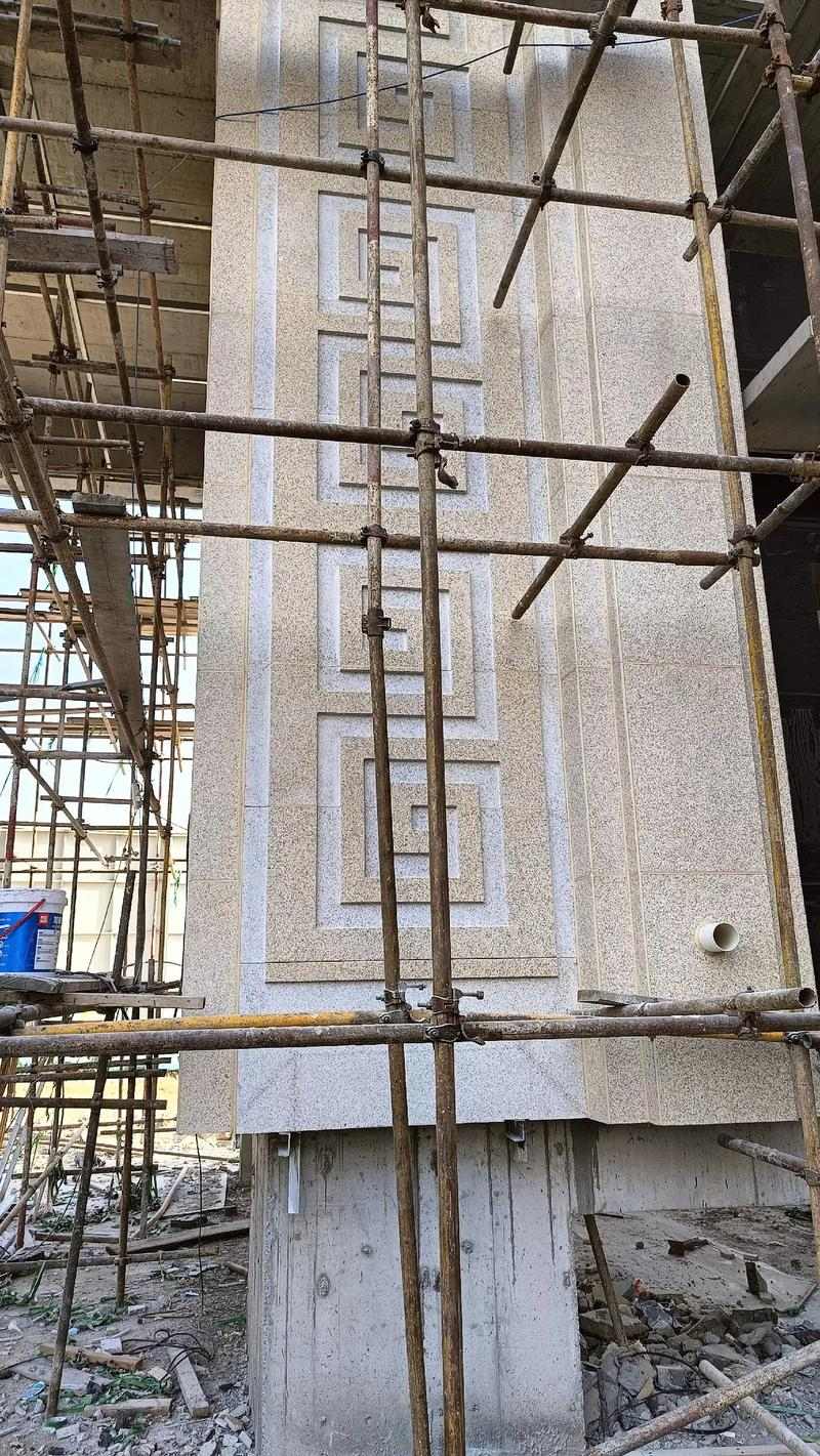 海南 黄金麻花岗岩别墅外墙干挂回纹造型效果