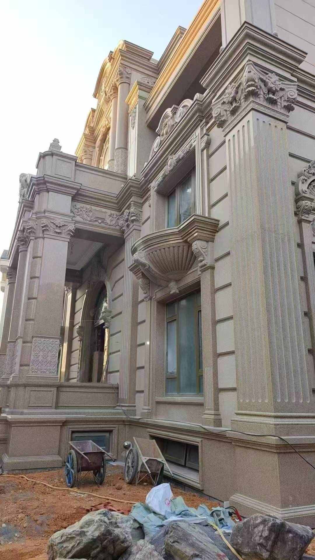 海南 黄金麻花岗岩光面别墅外墙干挂施工完成