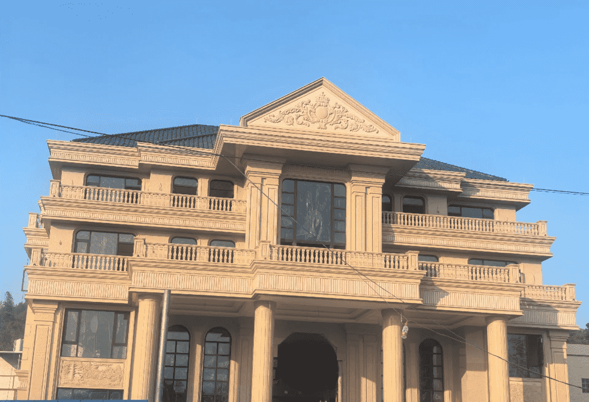 海南黄金麻别墅外墙干挂石材效果示例